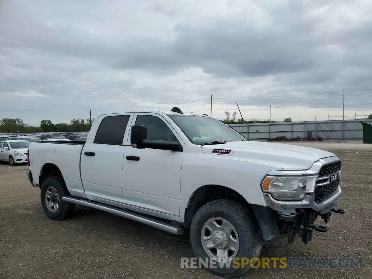 4 Photograph of a damaged car 3C6UR5CJ2MG558658 RAM 2500 2021