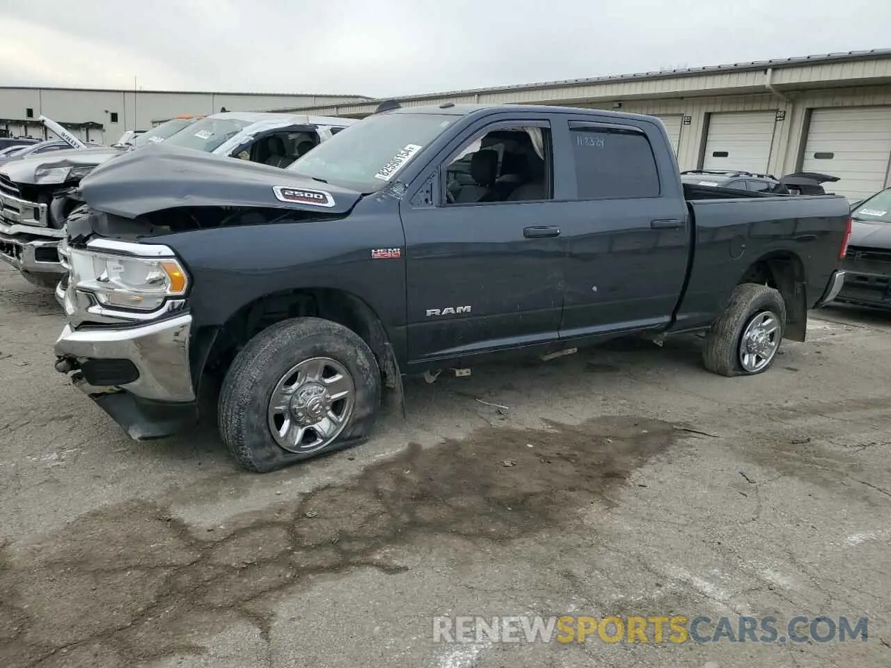 1 Photograph of a damaged car 3C6UR5CJ2MG561219 RAM 2500 2021