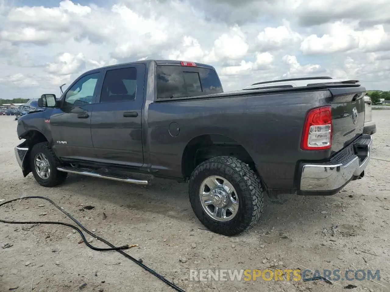 2 Photograph of a damaged car 3C6UR5CJ2MG608491 RAM 2500 2021