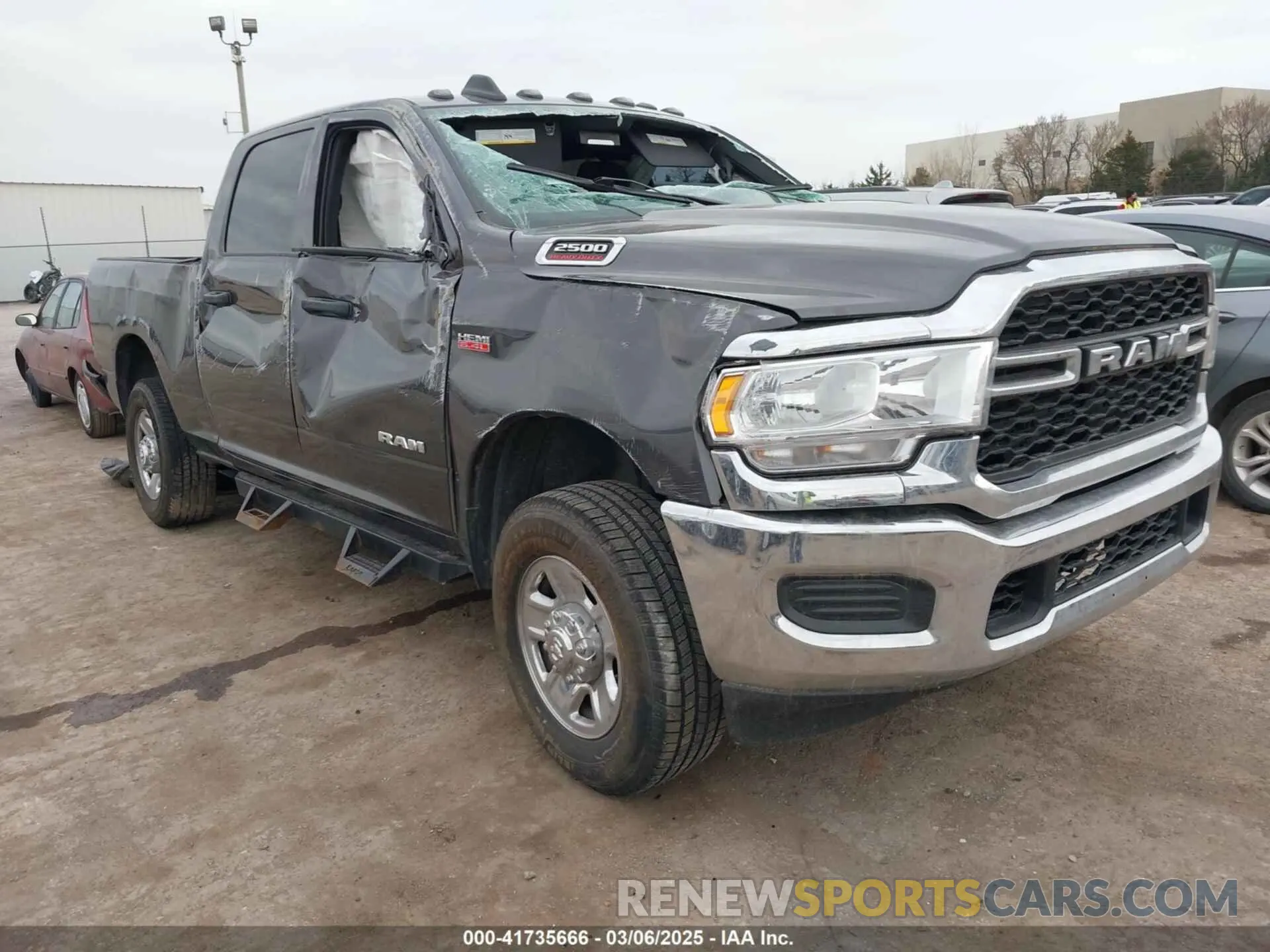 1 Photograph of a damaged car 3C6UR5CJ2MG639305 RAM 2500 2021