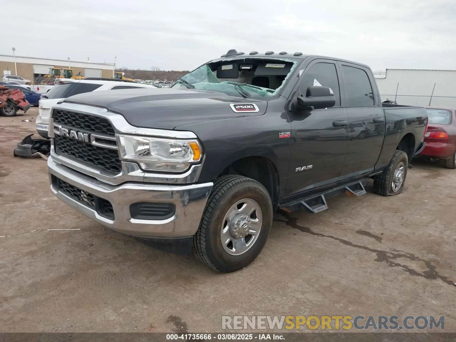 2 Photograph of a damaged car 3C6UR5CJ2MG639305 RAM 2500 2021