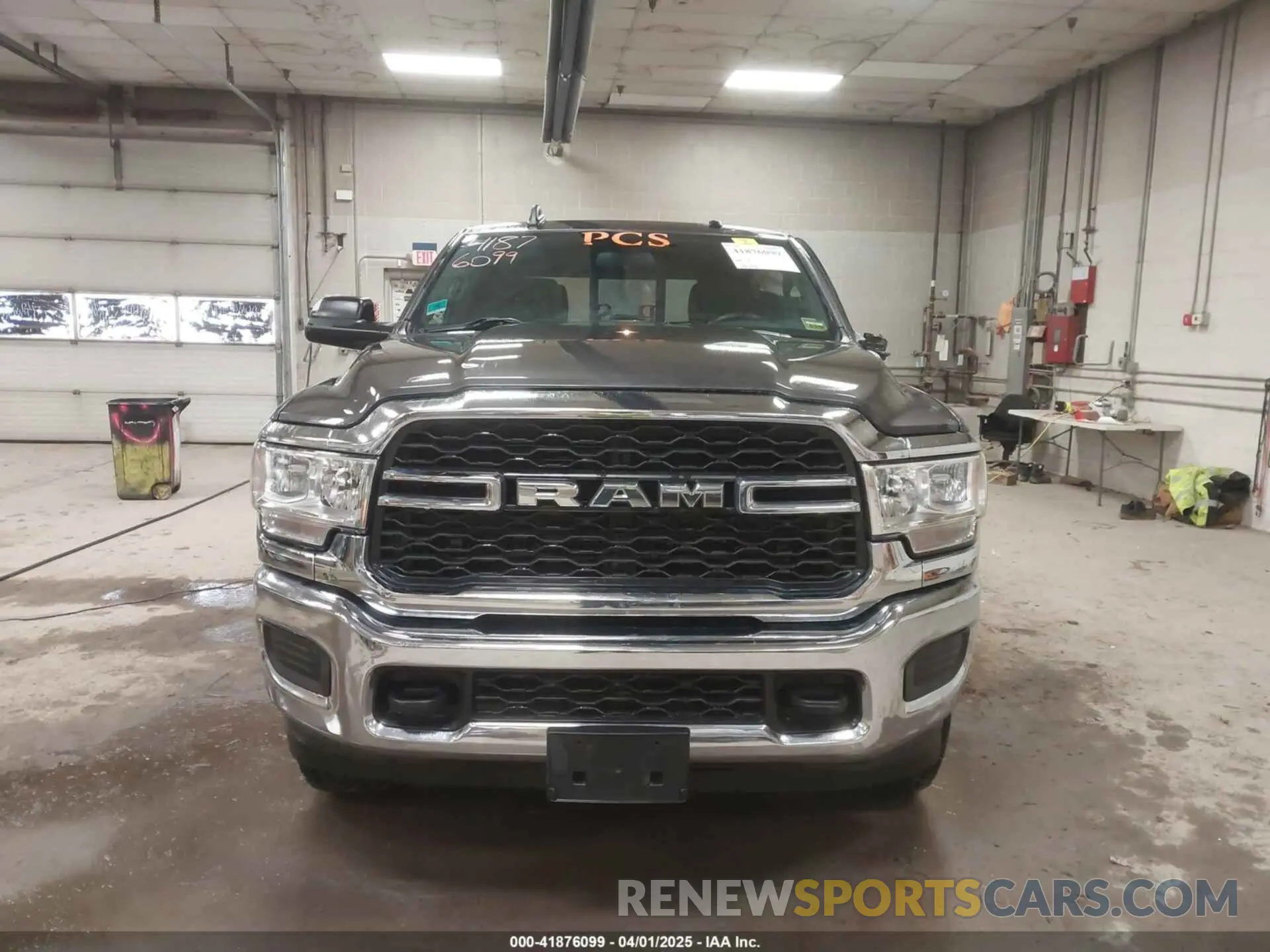 12 Photograph of a damaged car 3C6UR5CJ3MG681322 RAM 2500 2021