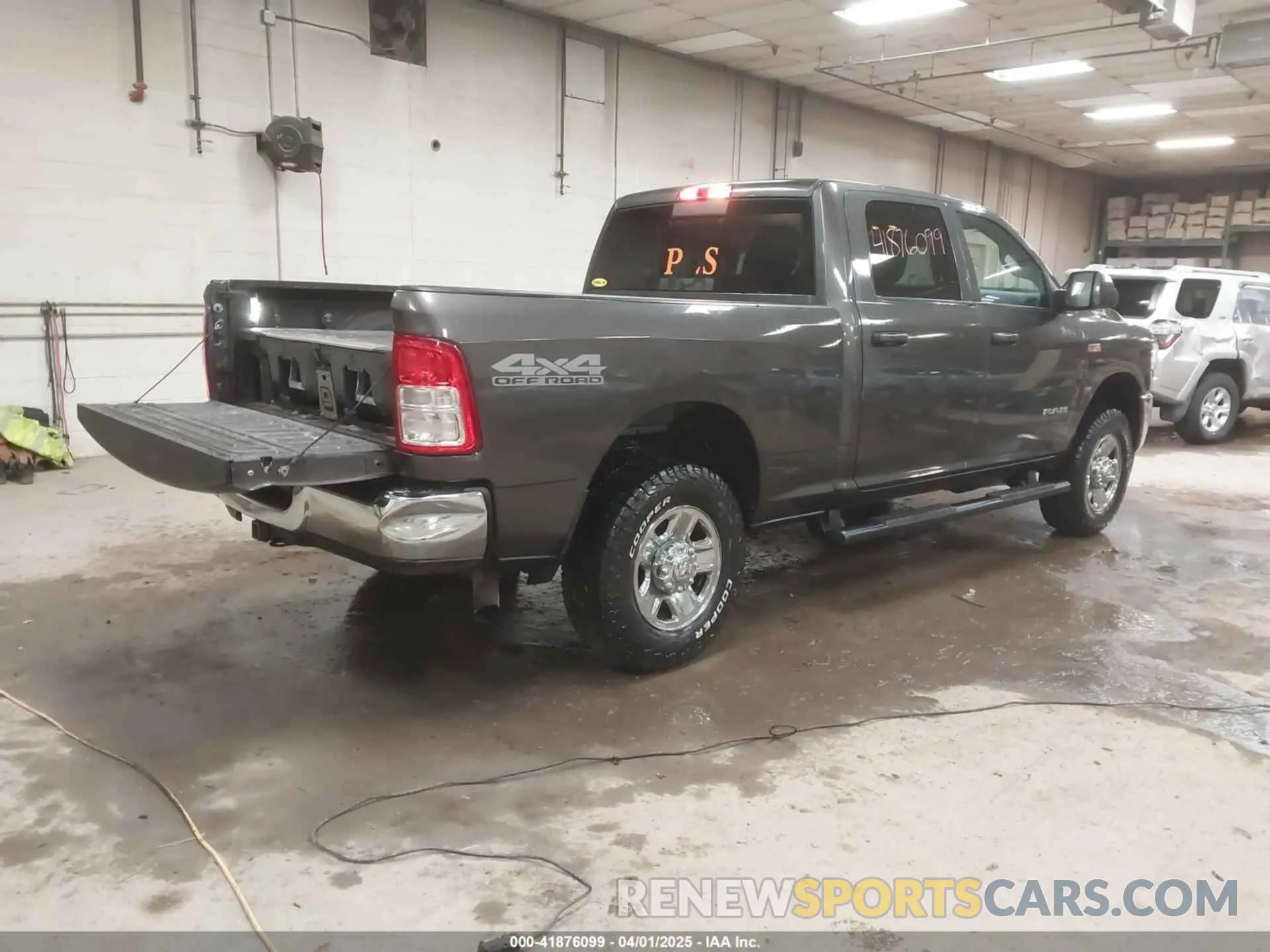 4 Photograph of a damaged car 3C6UR5CJ3MG681322 RAM 2500 2021