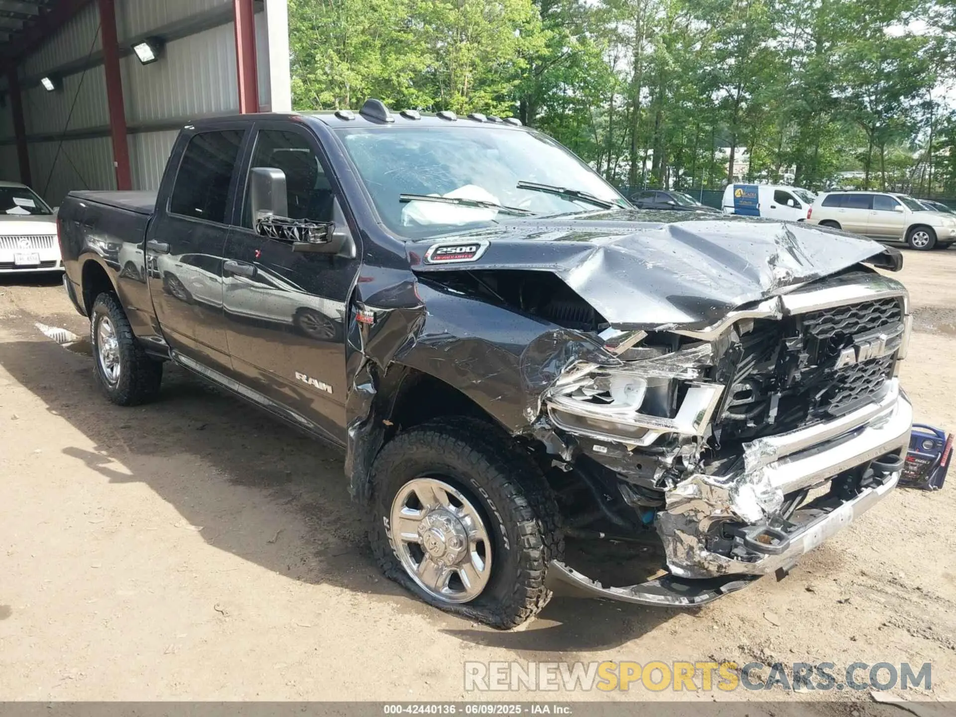 1 Photograph of a damaged car 3C6UR5CJ3MG697813 RAM 2500 2021