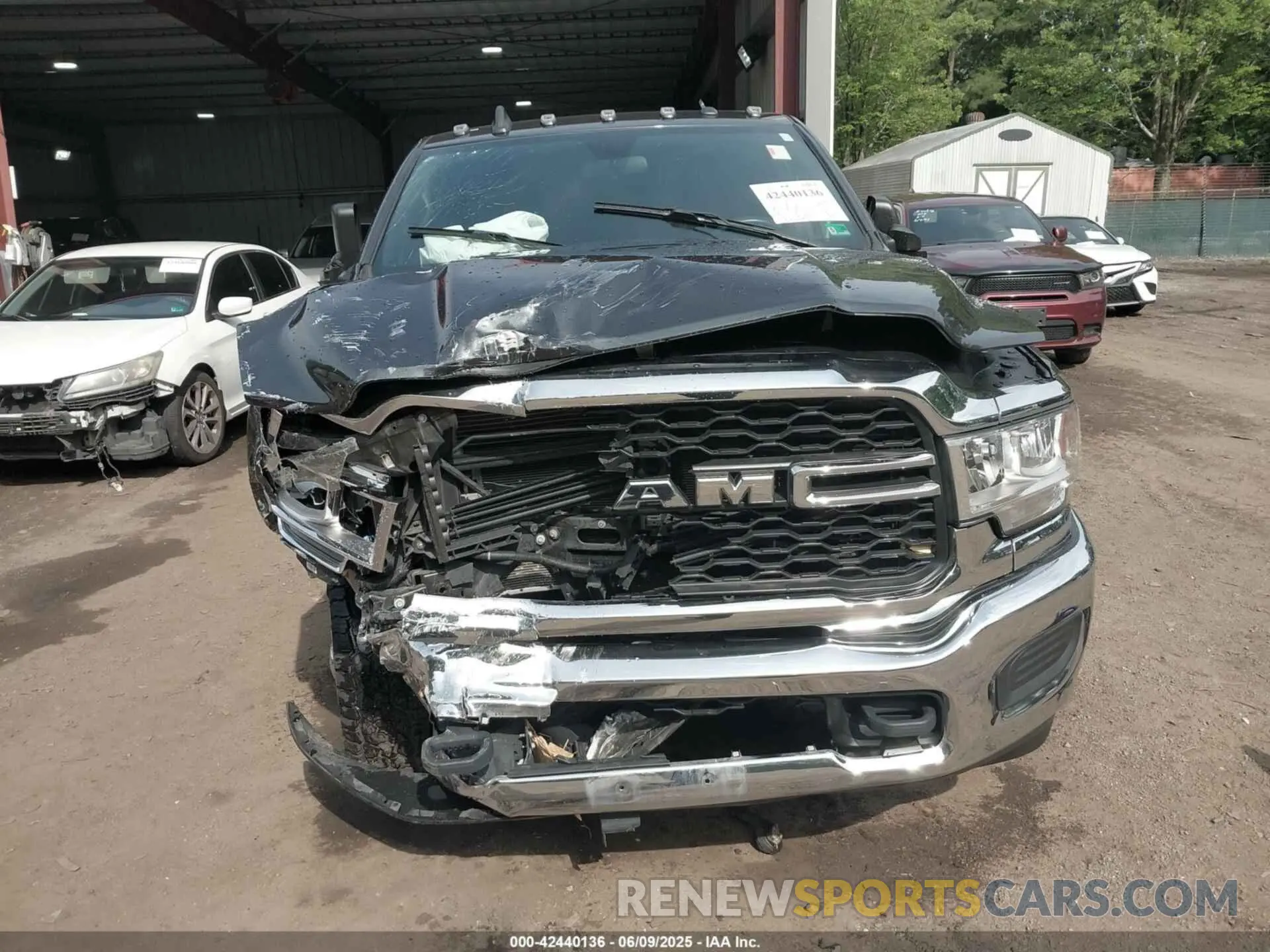 12 Photograph of a damaged car 3C6UR5CJ3MG697813 RAM 2500 2021