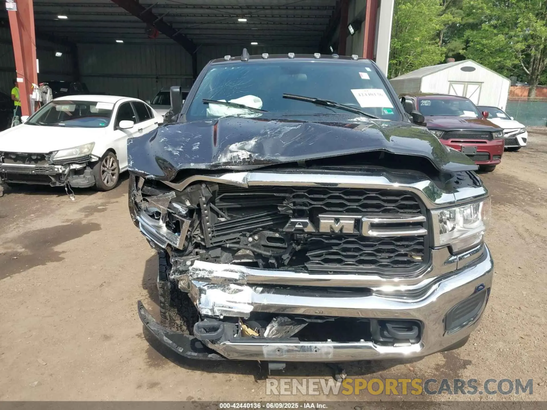 6 Photograph of a damaged car 3C6UR5CJ3MG697813 RAM 2500 2021