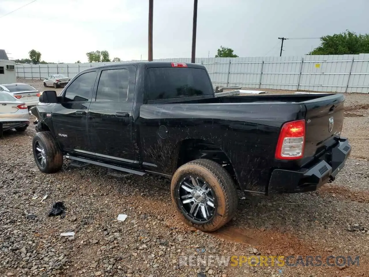 2 Photograph of a damaged car 3C6UR5CJ4MG591600 RAM 2500 2021