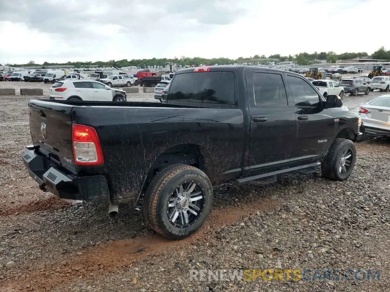 3 Photograph of a damaged car 3C6UR5CJ4MG591600 RAM 2500 2021
