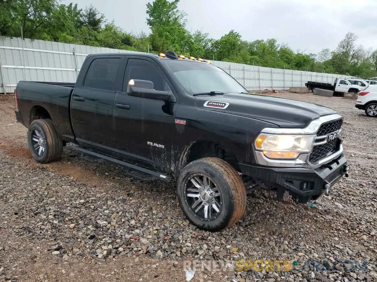 4 Photograph of a damaged car 3C6UR5CJ4MG591600 RAM 2500 2021