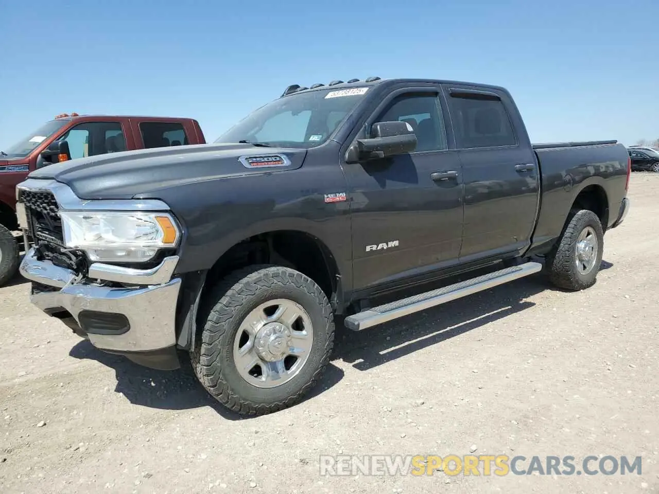 1 Photograph of a damaged car 3C6UR5CJ4MG638608 RAM 2500 2021