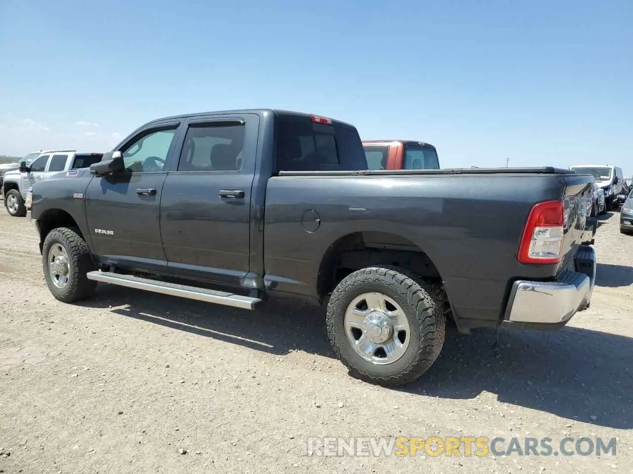 2 Photograph of a damaged car 3C6UR5CJ4MG638608 RAM 2500 2021