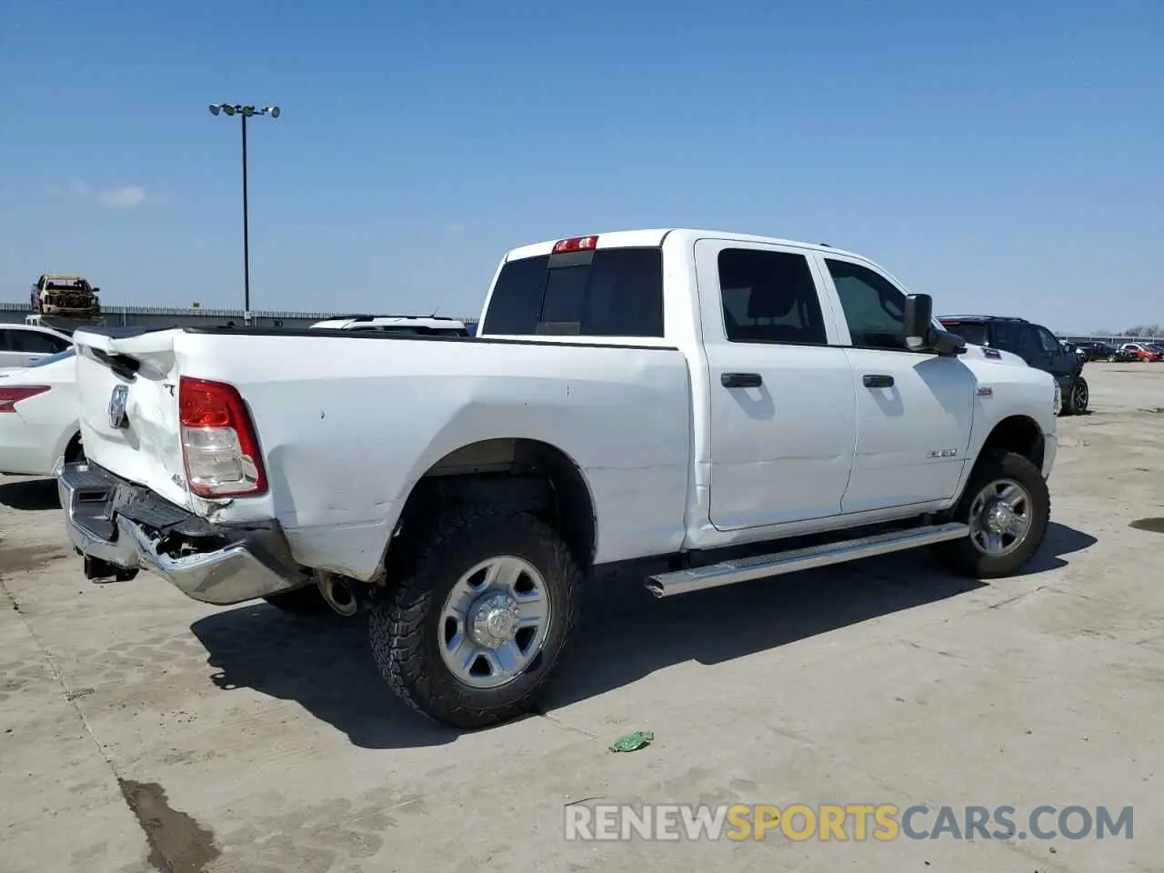 3 Photograph of a damaged car 3C6UR5CJ4MG698520 RAM 2500 2021