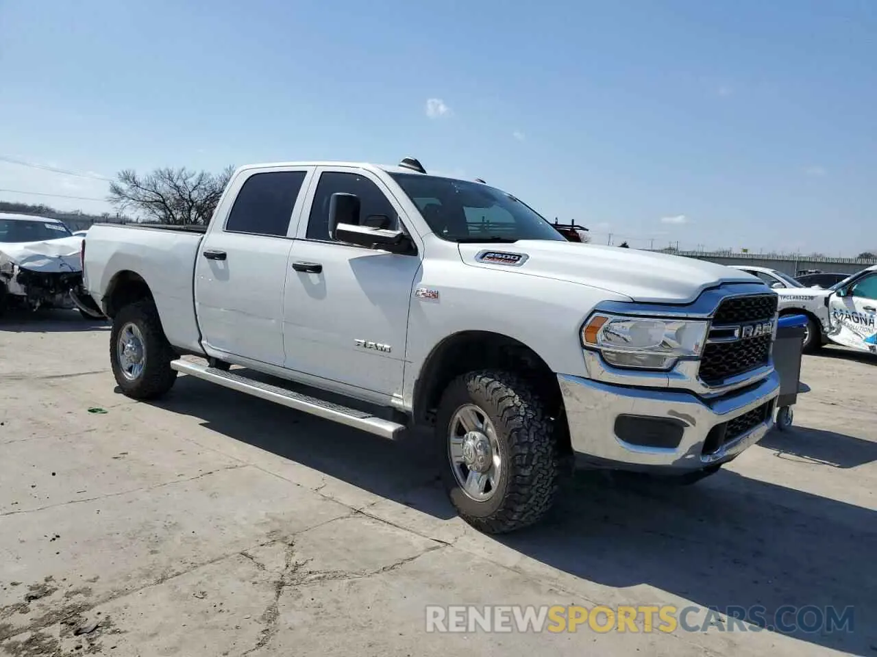 4 Photograph of a damaged car 3C6UR5CJ4MG698520 RAM 2500 2021