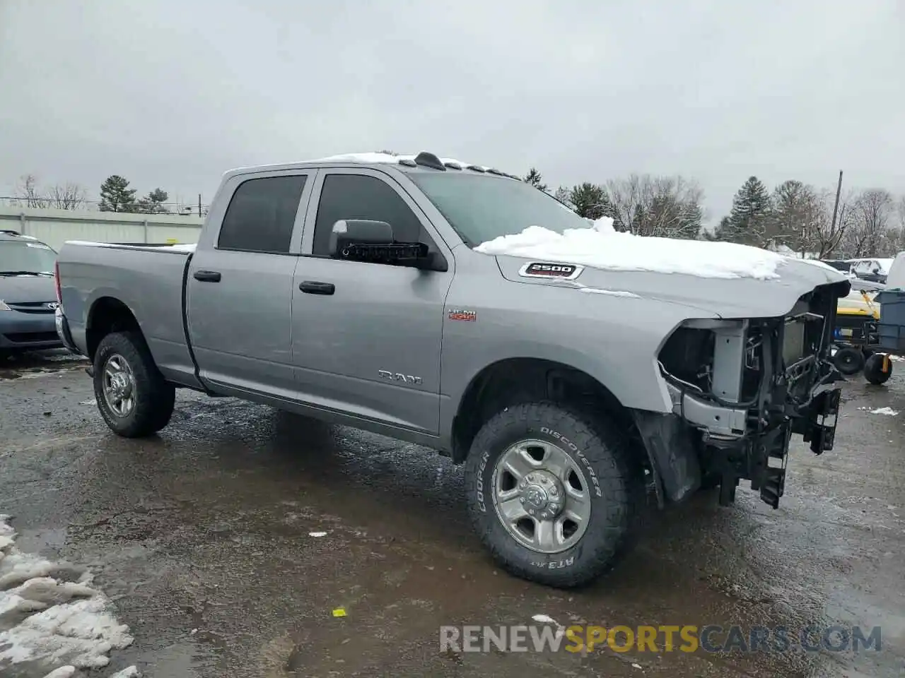 4 Photograph of a damaged car 3C6UR5CJ7MG582518 RAM 2500 2021