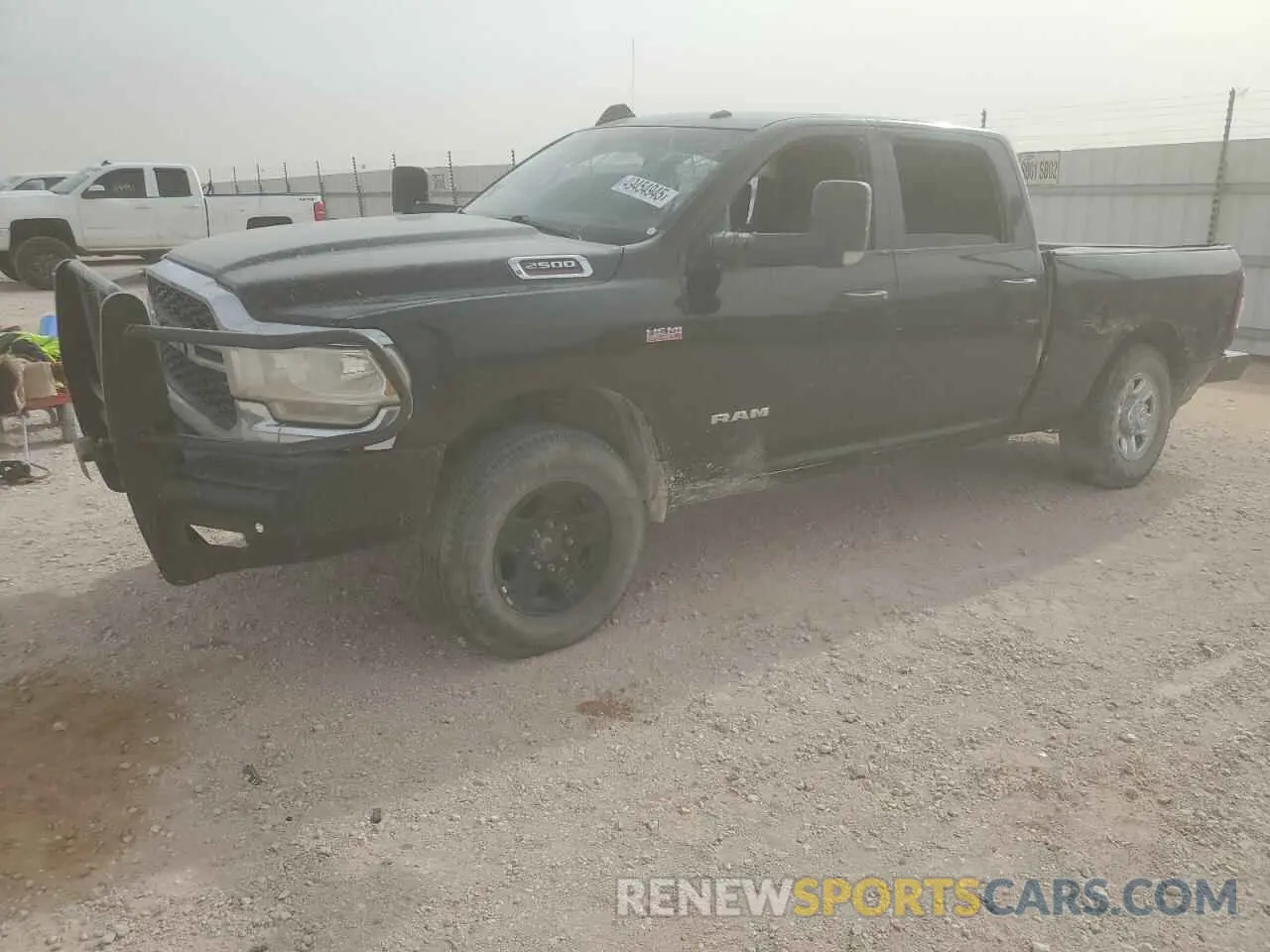 1 Photograph of a damaged car 3C6UR5CJ9MG516214 RAM 2500 2021