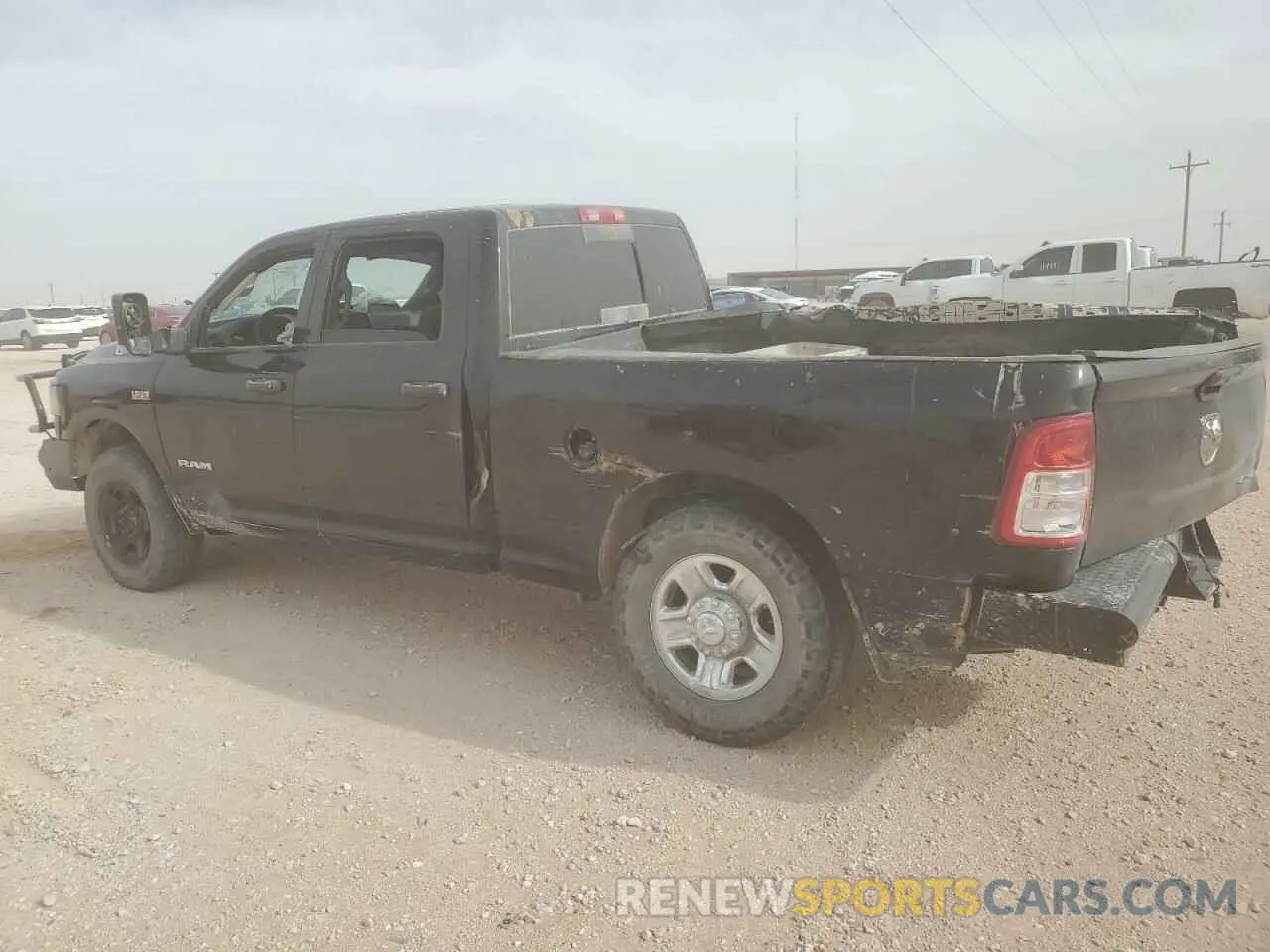2 Photograph of a damaged car 3C6UR5CJ9MG516214 RAM 2500 2021