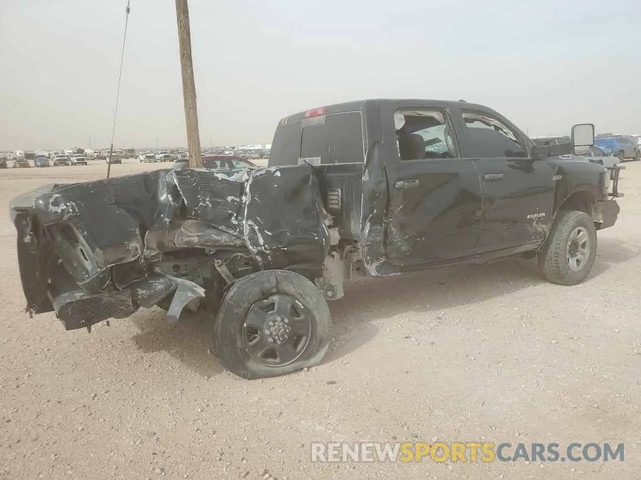 3 Photograph of a damaged car 3C6UR5CJ9MG516214 RAM 2500 2021