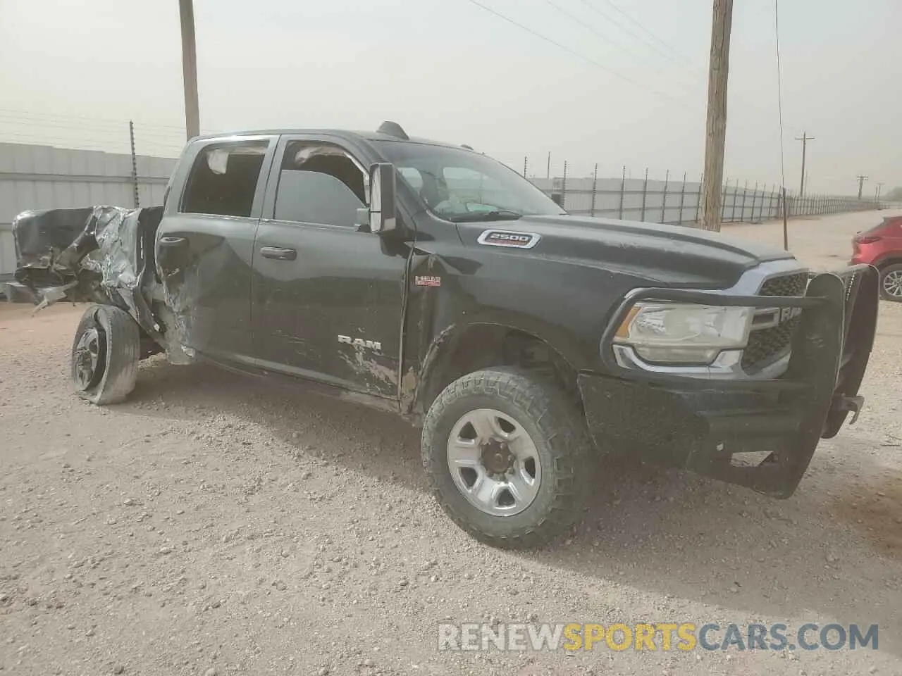 4 Photograph of a damaged car 3C6UR5CJ9MG516214 RAM 2500 2021