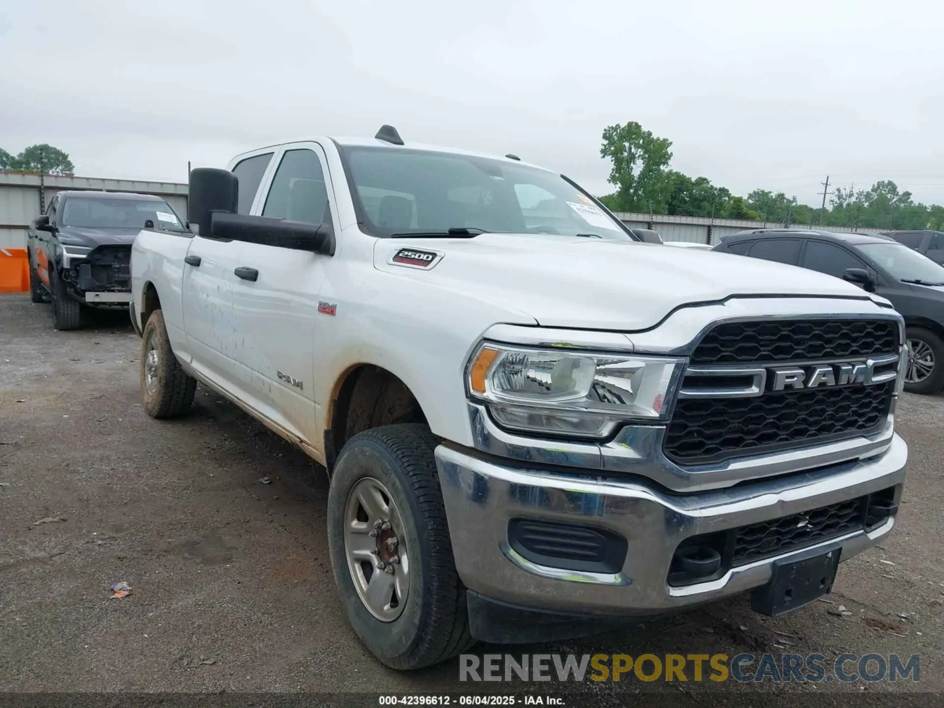 1 Photograph of a damaged car 3C6UR5CJ9MG532722 RAM 2500 2021
