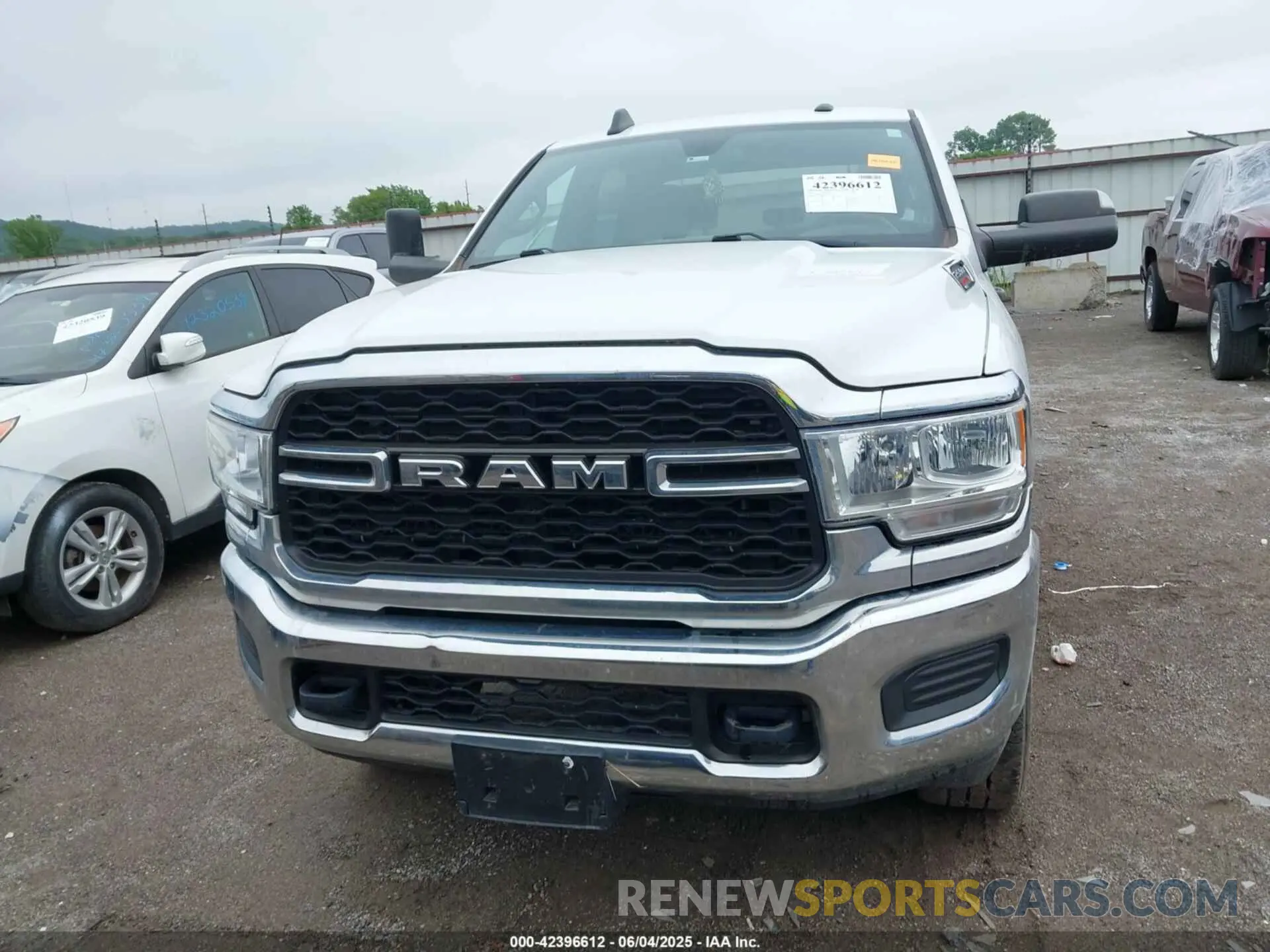 12 Photograph of a damaged car 3C6UR5CJ9MG532722 RAM 2500 2021