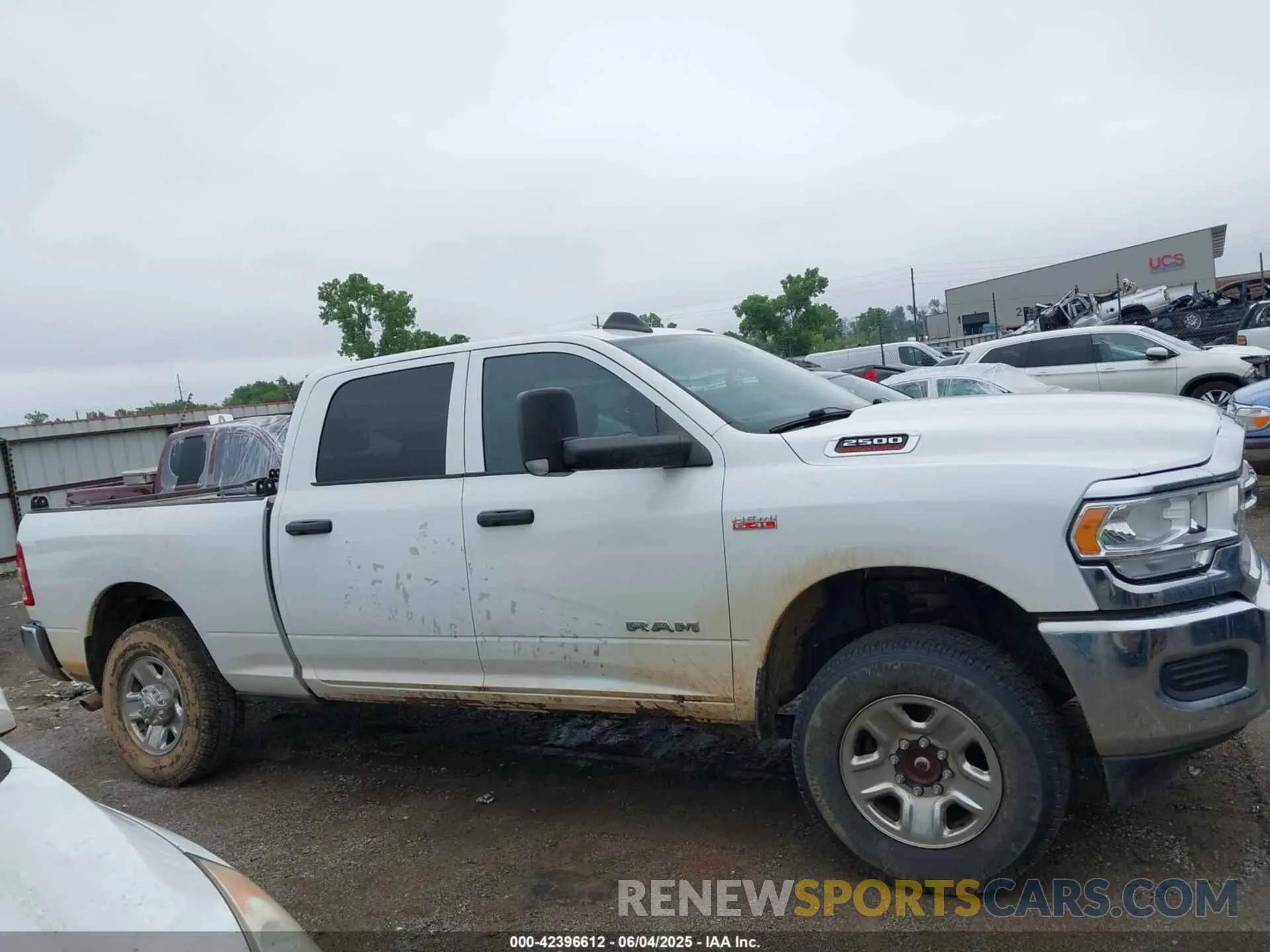 13 Photograph of a damaged car 3C6UR5CJ9MG532722 RAM 2500 2021