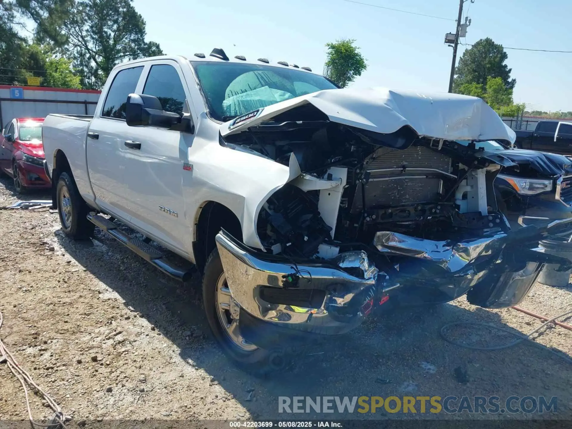 1 Photograph of a damaged car 3C6UR5CJ9MG641813 RAM 2500 2021