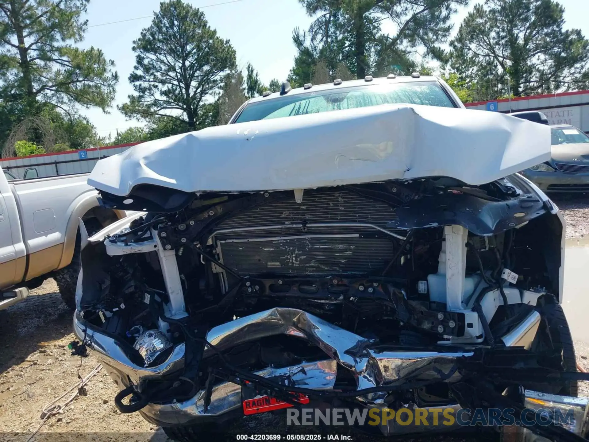 13 Photograph of a damaged car 3C6UR5CJ9MG641813 RAM 2500 2021