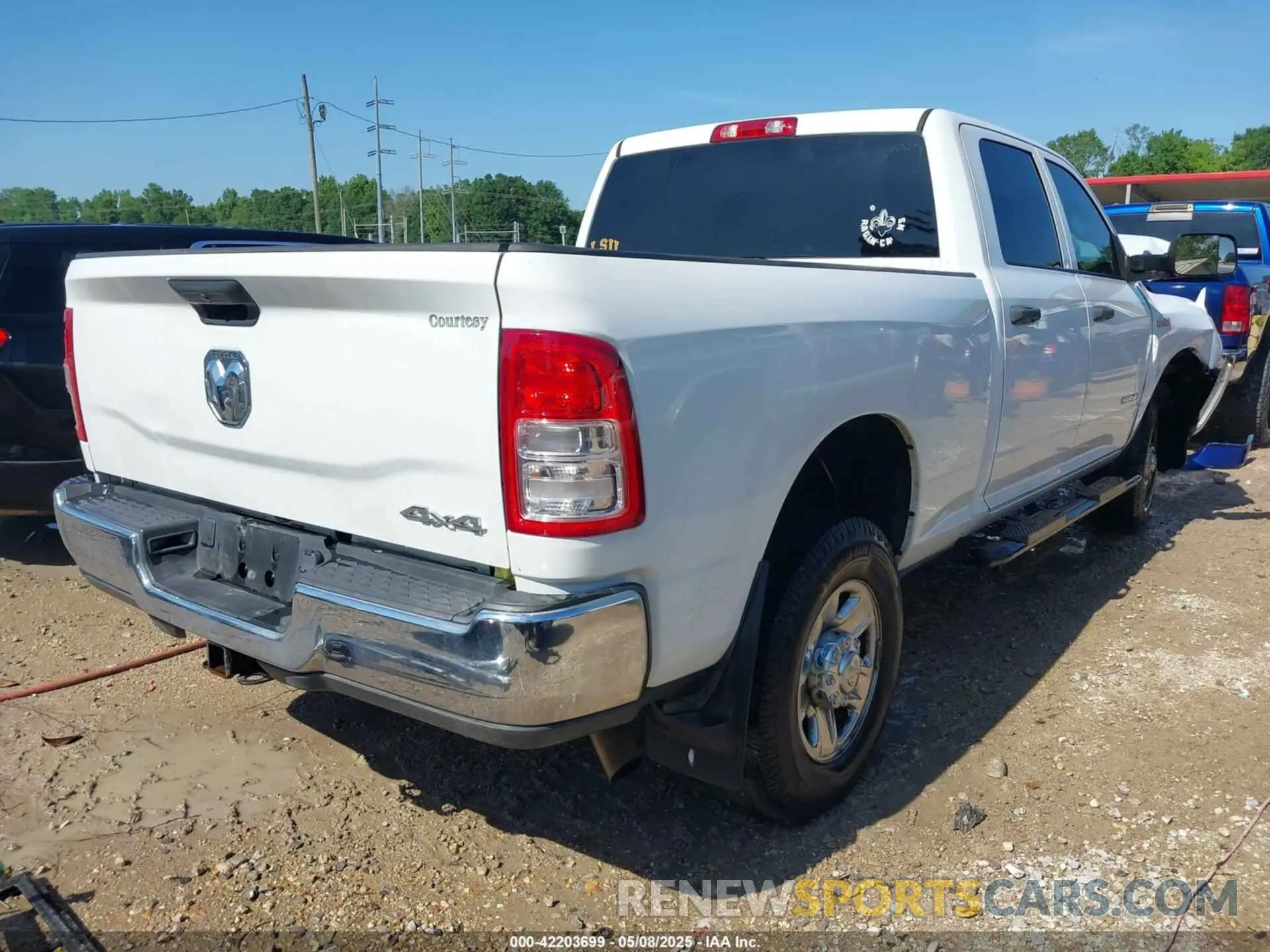 4 Photograph of a damaged car 3C6UR5CJ9MG641813 RAM 2500 2021