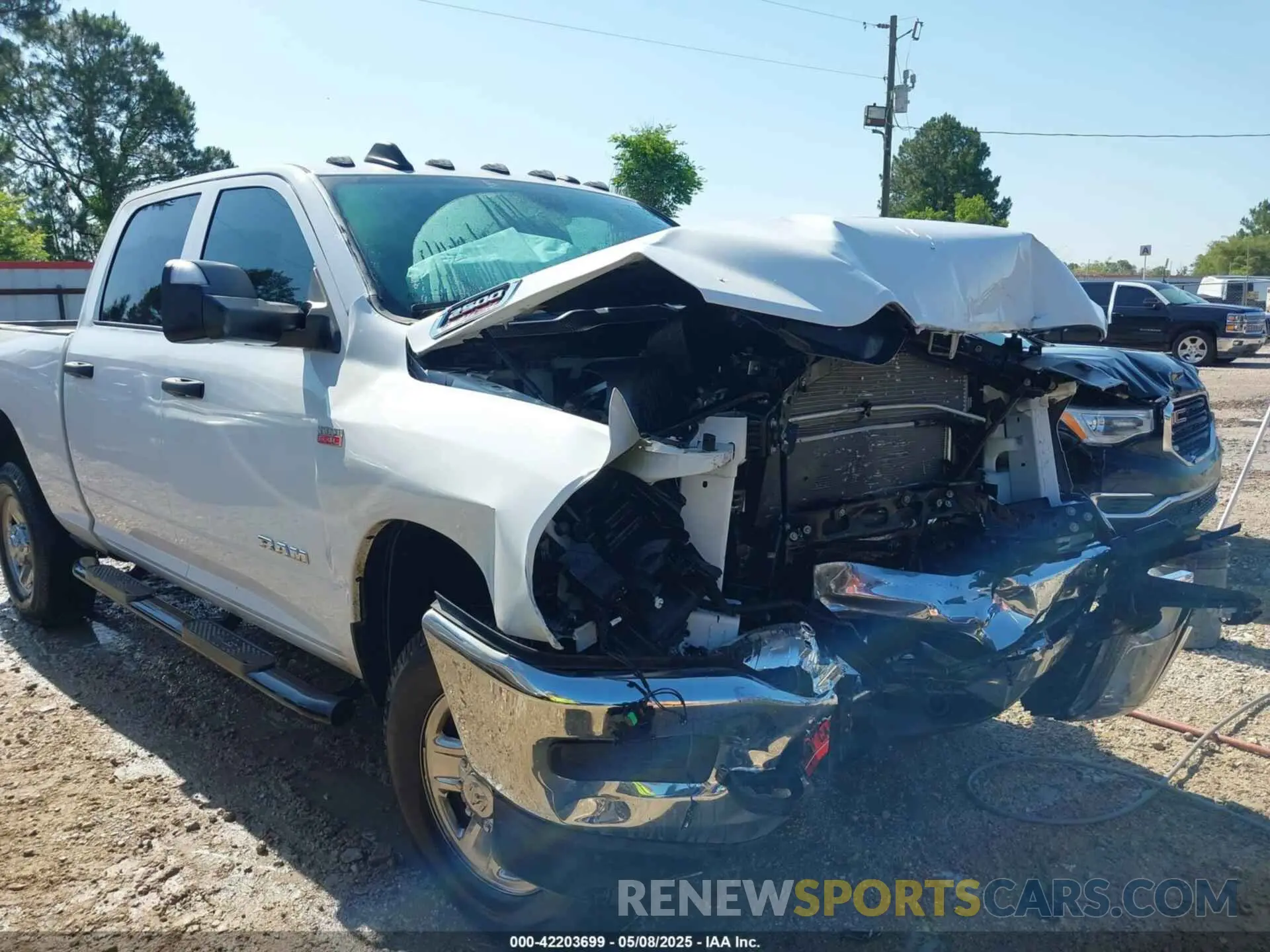 6 Photograph of a damaged car 3C6UR5CJ9MG641813 RAM 2500 2021