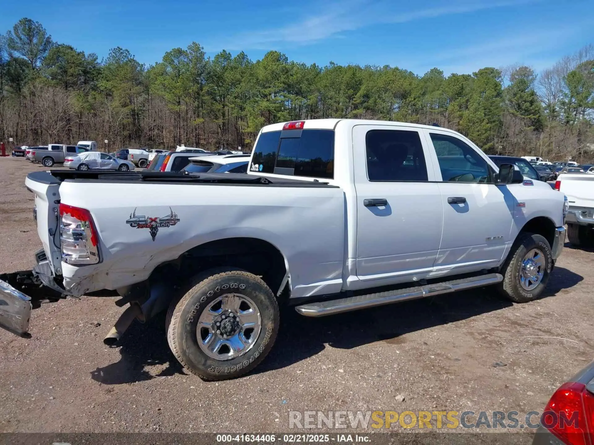 13 Photograph of a damaged car 3C6UR5CJ9MG656862 RAM 2500 2021