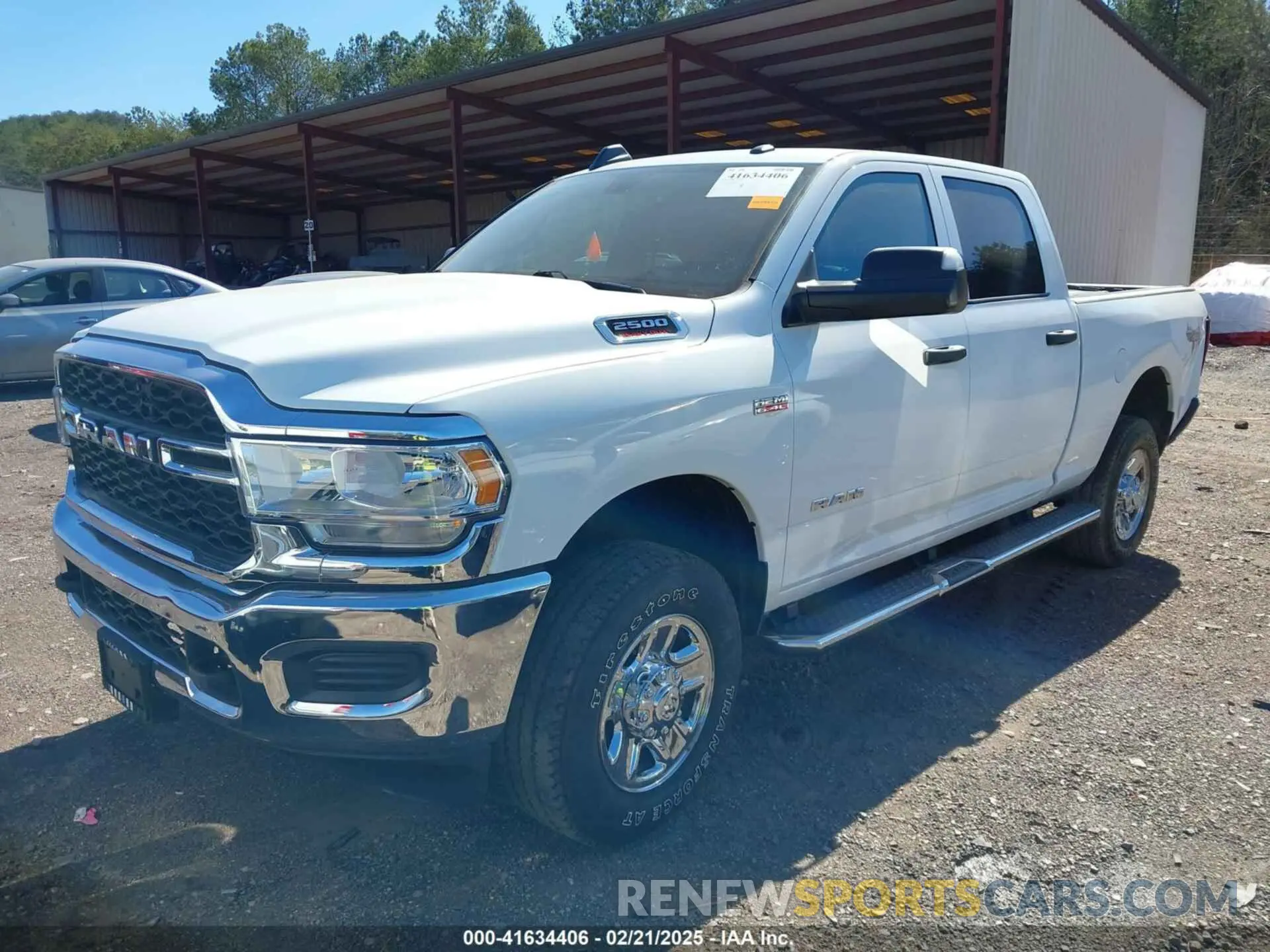 2 Photograph of a damaged car 3C6UR5CJ9MG656862 RAM 2500 2021