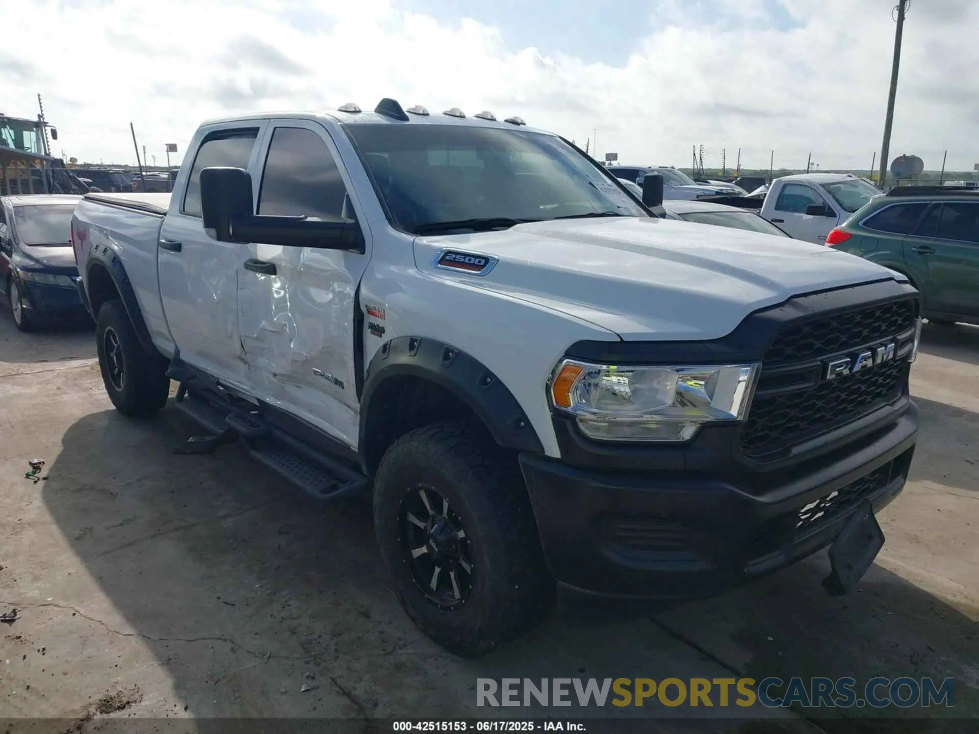 1 Photograph of a damaged car 3C6UR5CJXMG611381 RAM 2500 2021