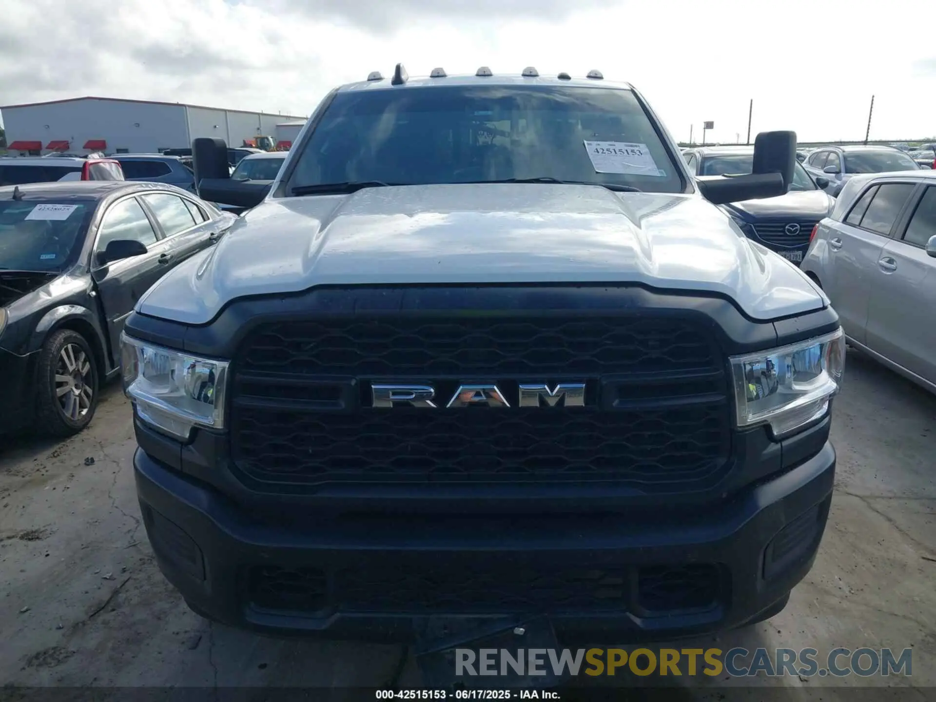 12 Photograph of a damaged car 3C6UR5CJXMG611381 RAM 2500 2021
