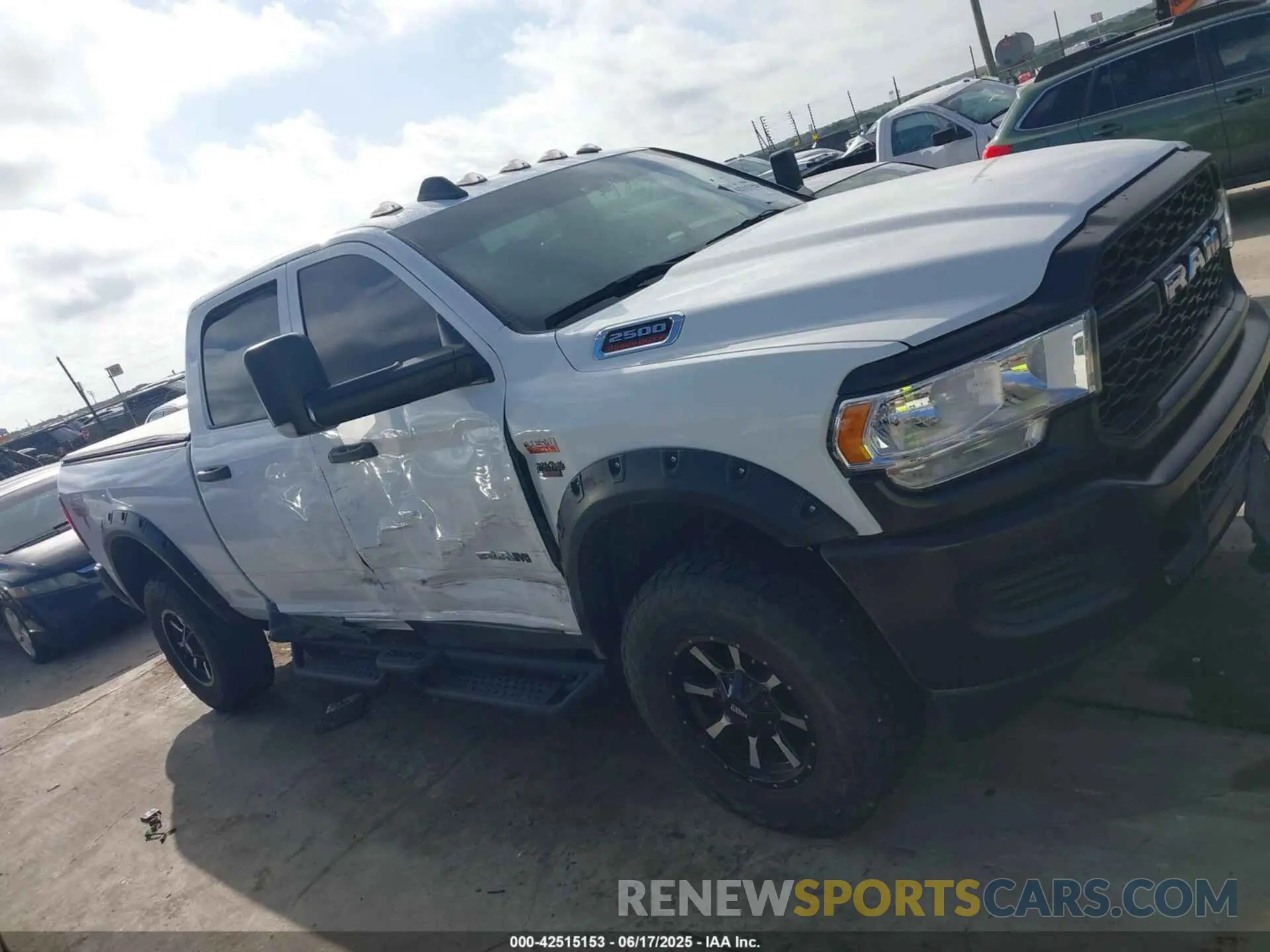 13 Photograph of a damaged car 3C6UR5CJXMG611381 RAM 2500 2021