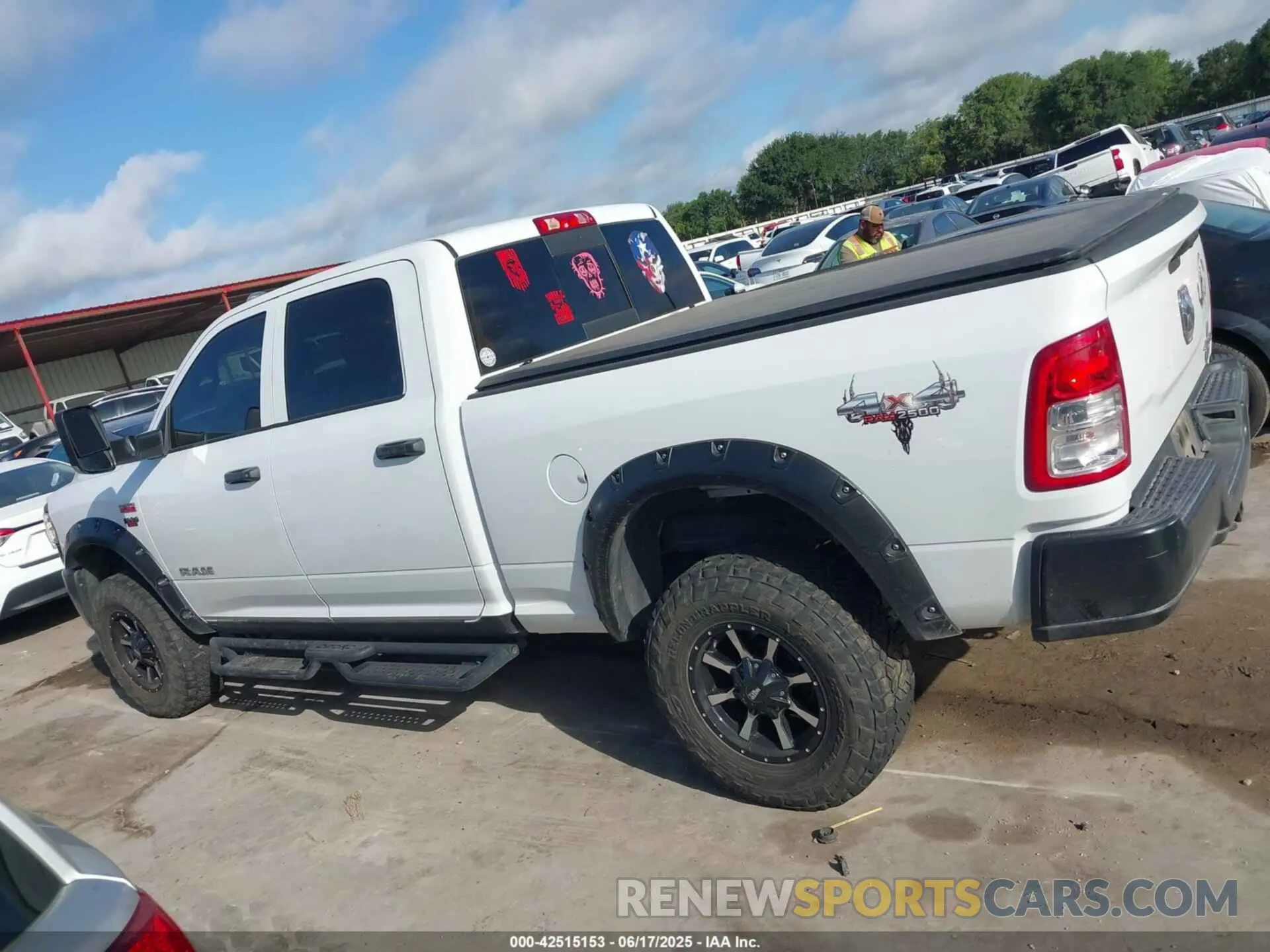 14 Photograph of a damaged car 3C6UR5CJXMG611381 RAM 2500 2021