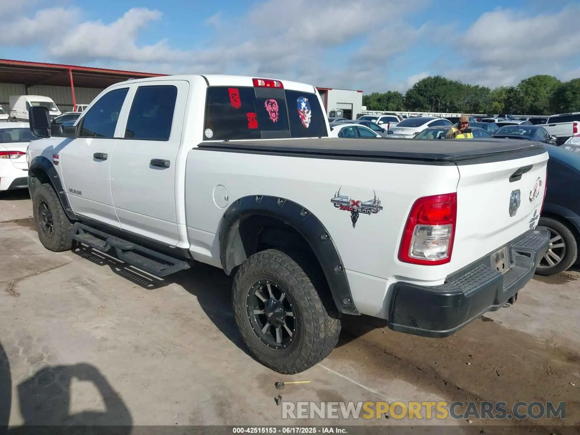 3 Photograph of a damaged car 3C6UR5CJXMG611381 RAM 2500 2021
