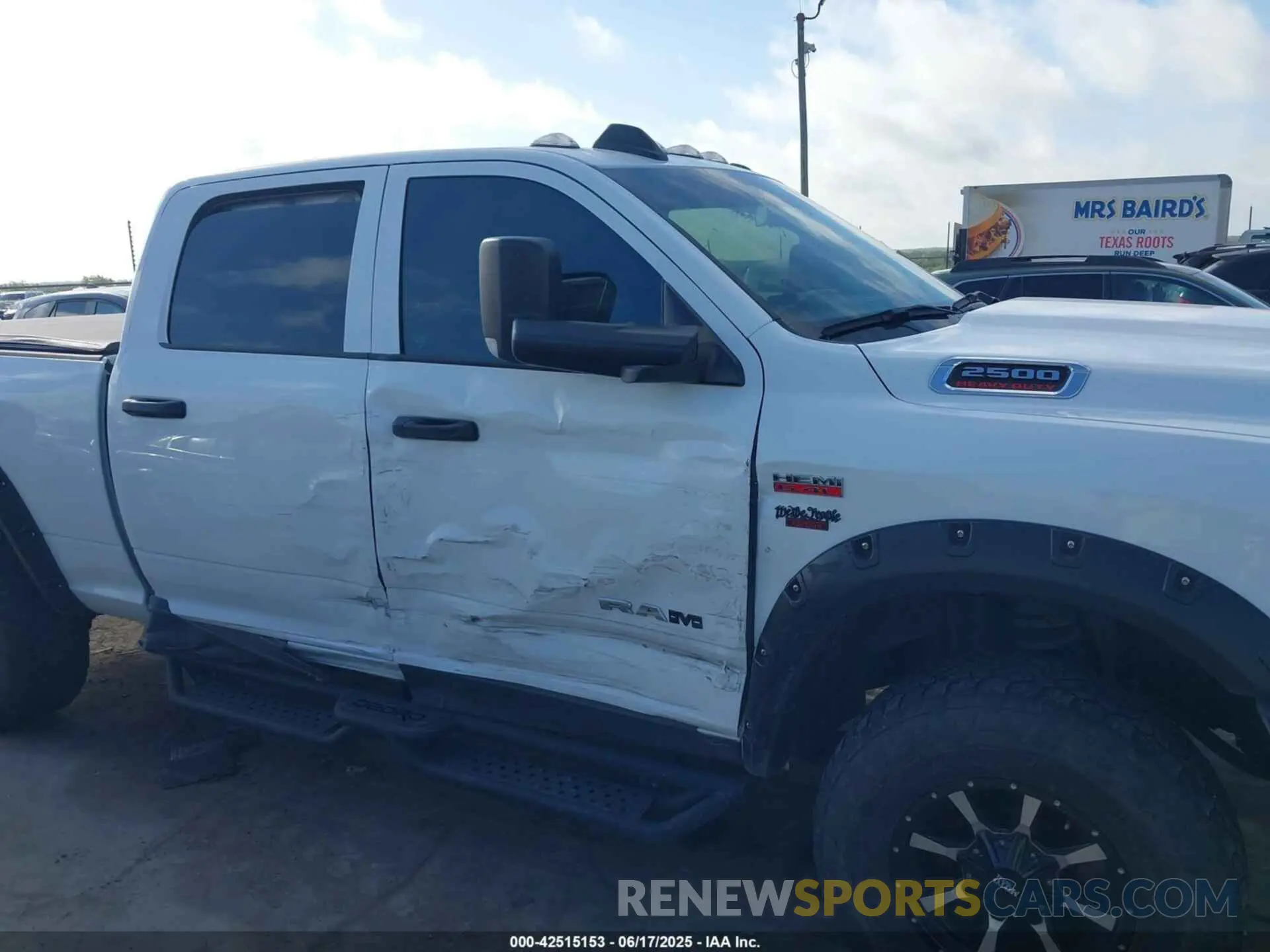 6 Photograph of a damaged car 3C6UR5CJXMG611381 RAM 2500 2021