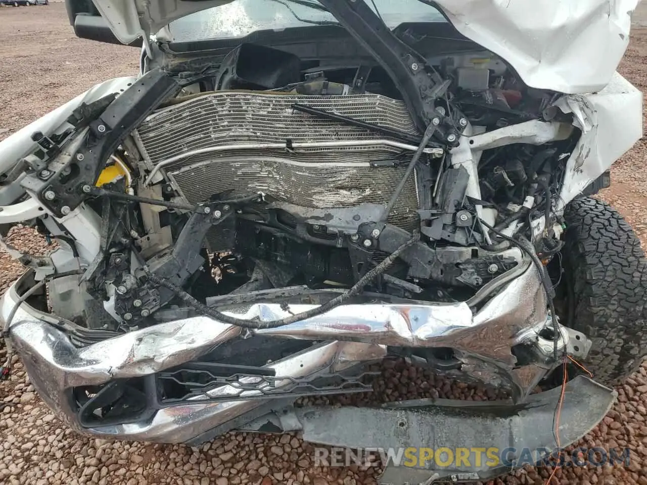 11 Photograph of a damaged car 3C6UR5CJXMG672598 RAM 2500 2021