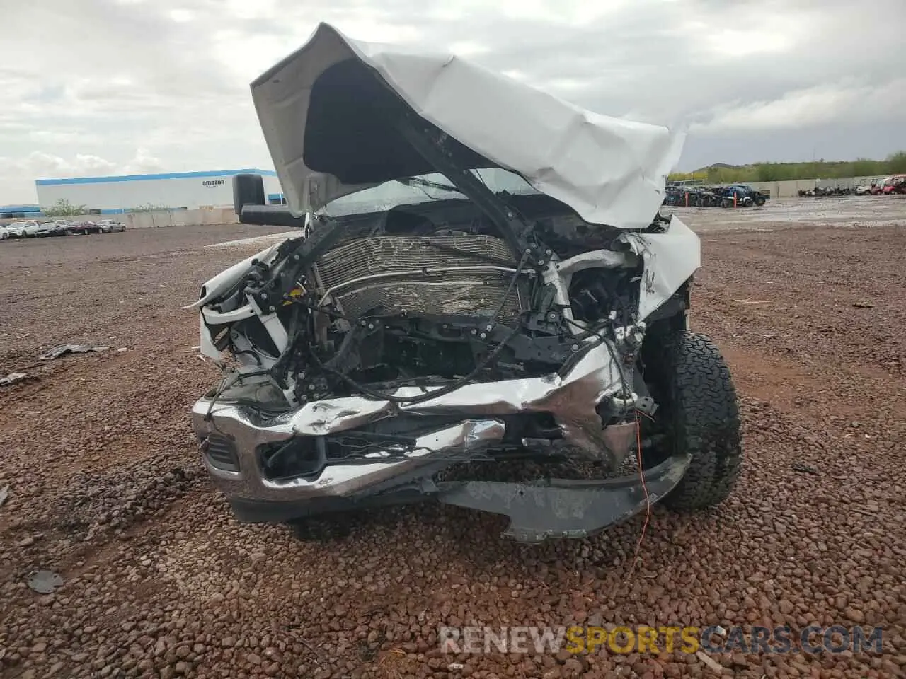 5 Photograph of a damaged car 3C6UR5CJXMG672598 RAM 2500 2021