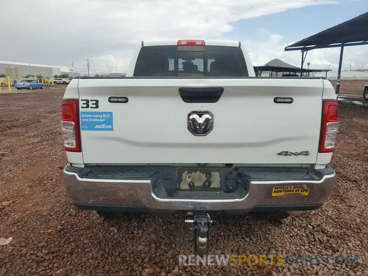 6 Photograph of a damaged car 3C6UR5CJXMG672598 RAM 2500 2021