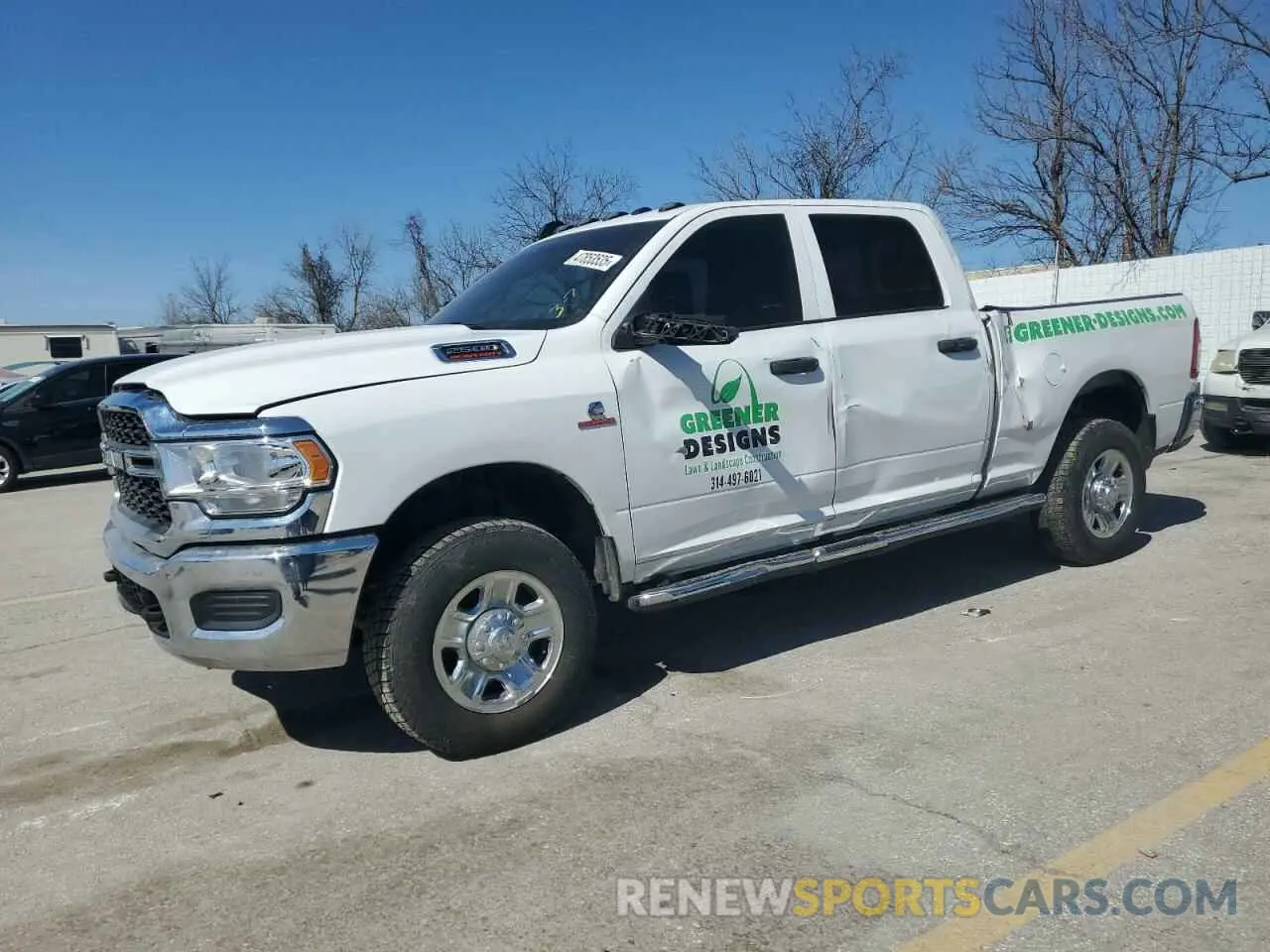 1 Photograph of a damaged car 3C6UR5CL0MG557252 RAM 2500 2021