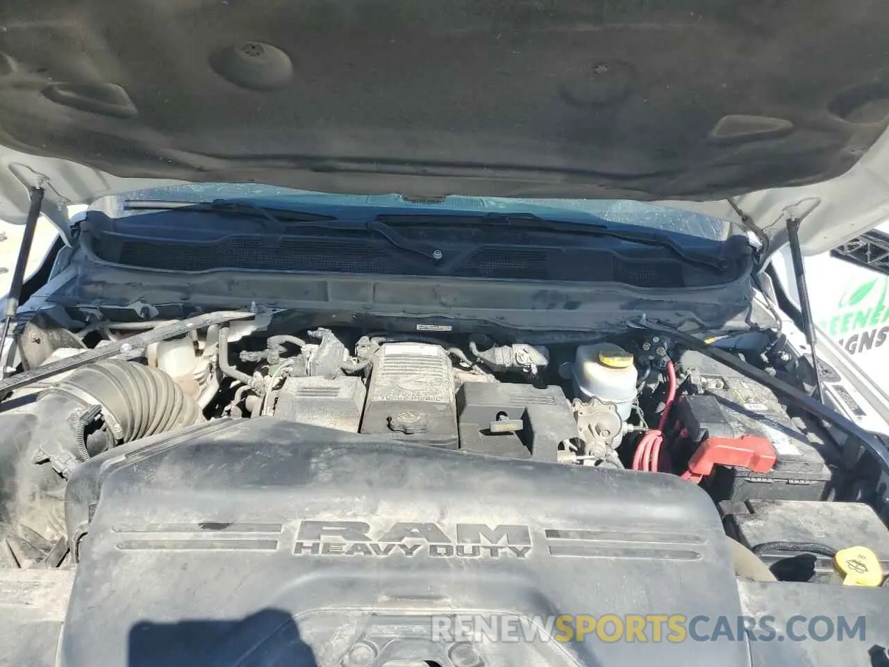 11 Photograph of a damaged car 3C6UR5CL0MG557252 RAM 2500 2021