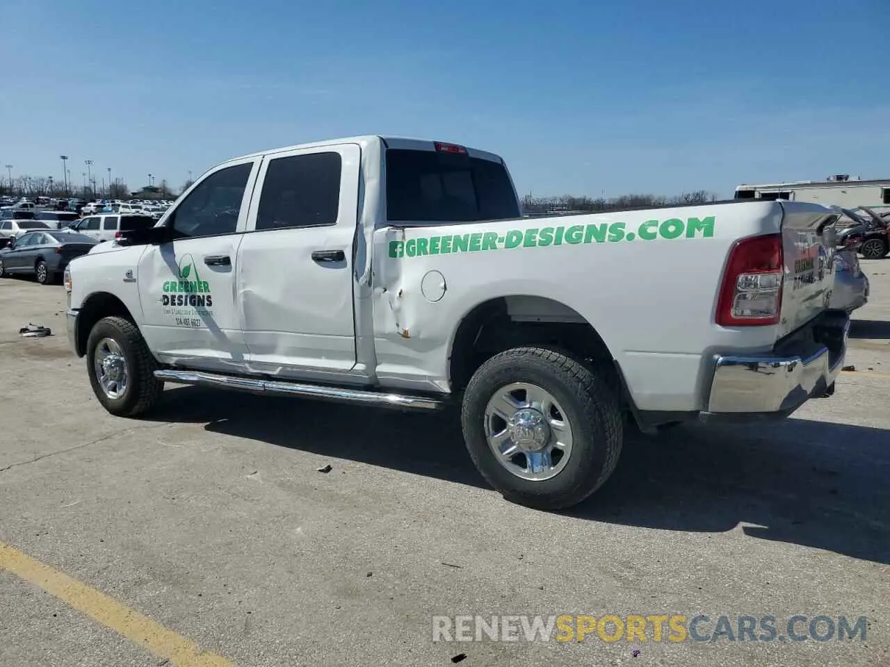 2 Photograph of a damaged car 3C6UR5CL0MG557252 RAM 2500 2021