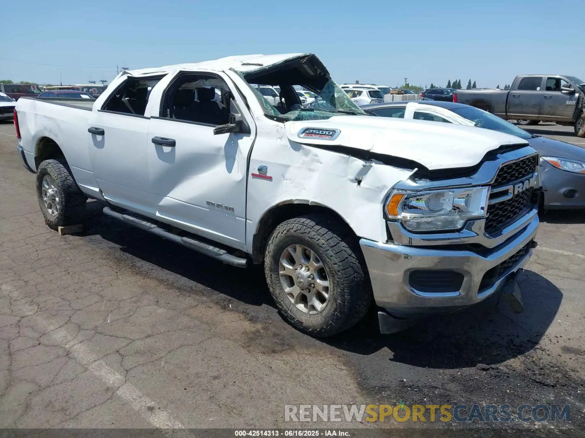 1 Photograph of a damaged car 3C6UR5CL1MG630533 RAM 2500 2021