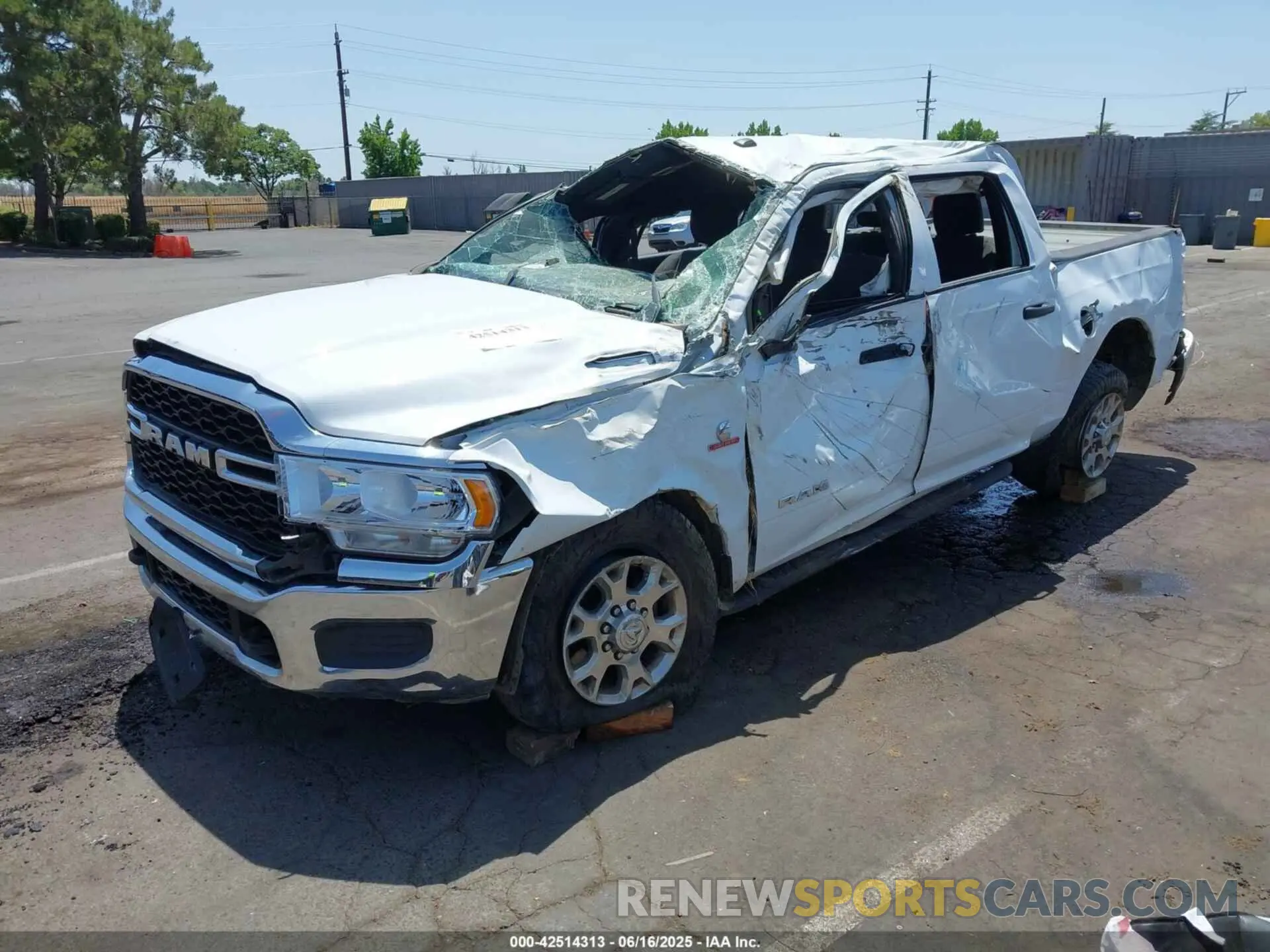 2 Photograph of a damaged car 3C6UR5CL1MG630533 RAM 2500 2021
