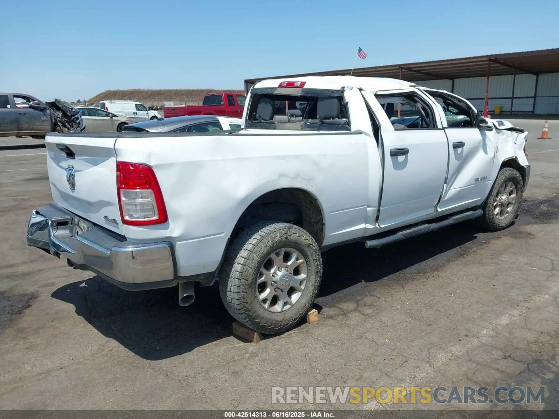 4 Photograph of a damaged car 3C6UR5CL1MG630533 RAM 2500 2021