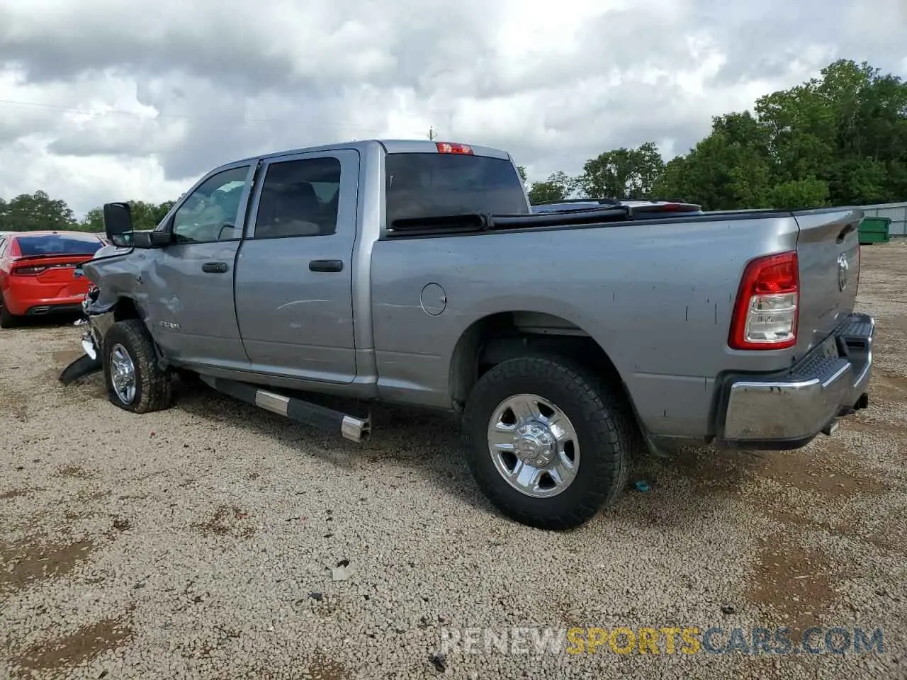 2 Photograph of a damaged car 3C6UR5CL2MG519358 RAM 2500 2021