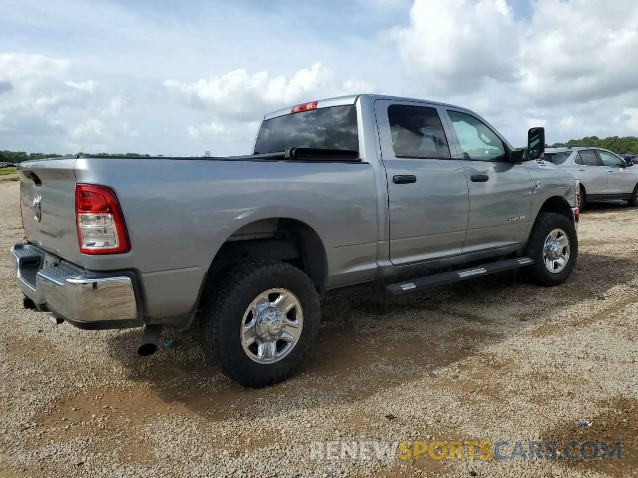 3 Photograph of a damaged car 3C6UR5CL2MG519358 RAM 2500 2021