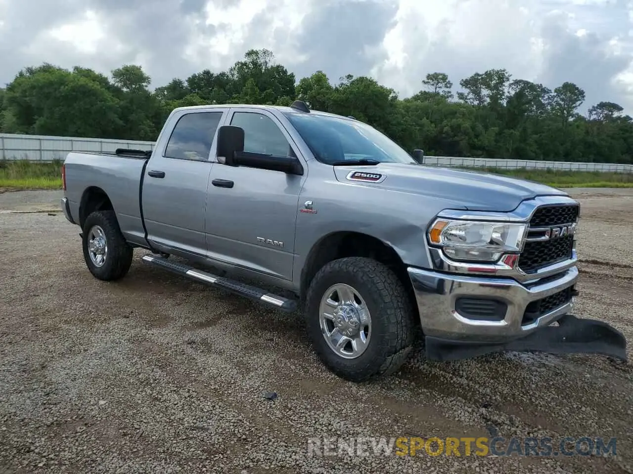 4 Photograph of a damaged car 3C6UR5CL2MG519358 RAM 2500 2021