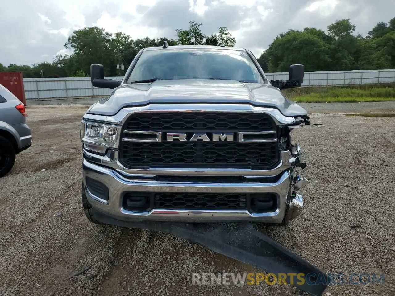 5 Photograph of a damaged car 3C6UR5CL2MG519358 RAM 2500 2021